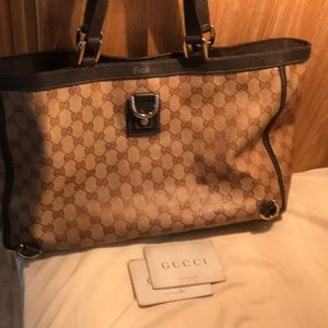 100% authentic Gucci coated canvas handbag